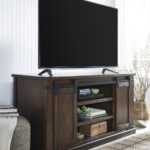 Budmore 60" TV Stand By Ashley with TV on top product image