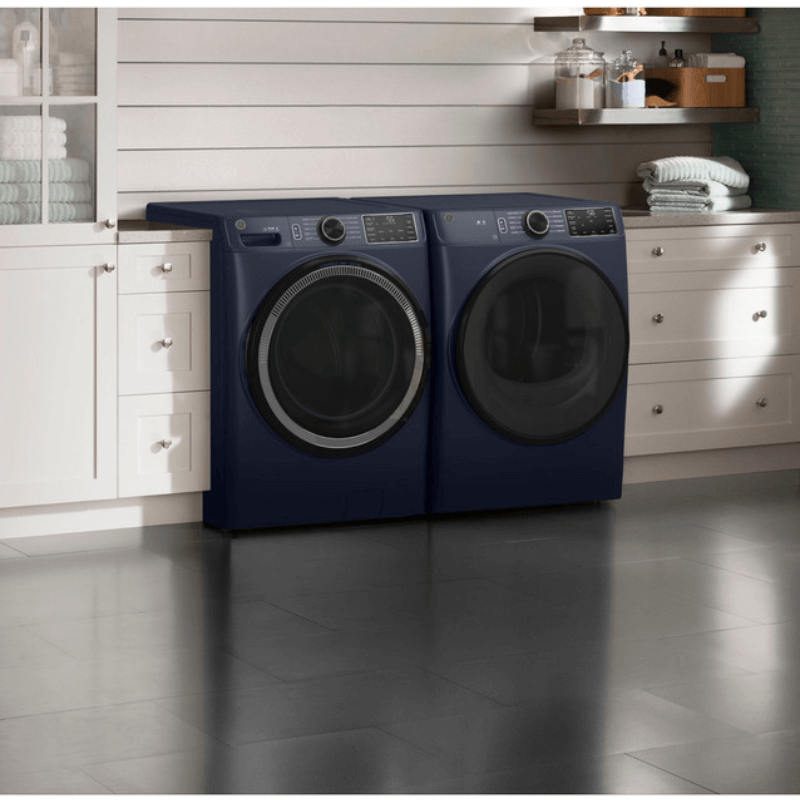 GE® 7.8 cu. ft. Capacity Smart Front Load Gas Dryer with Sanitize Cycle in room with dryer product image