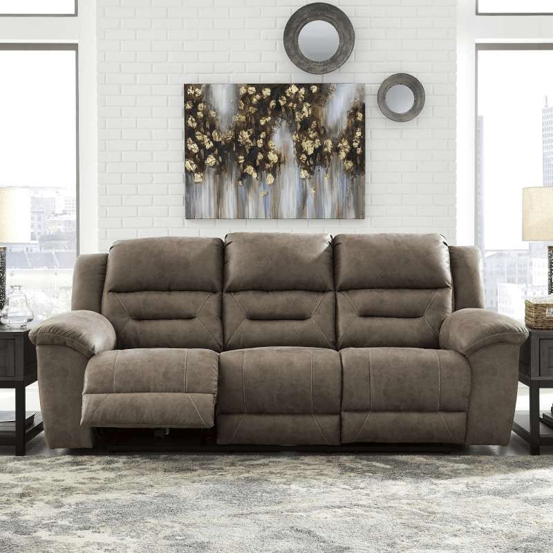 Stoneland Manual Reclining Sofa in Fossil Finish By Ashley in room product image