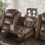 The Man-Den Triple Power Reclining Sofa By Ashley center seat transformer with lights, cupholder, power and storage product image