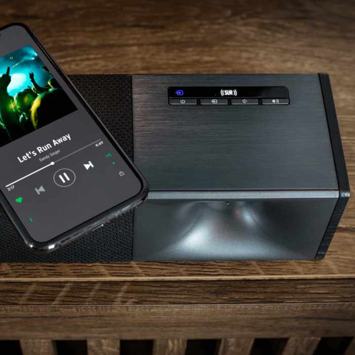 Cinema 600 Sound Bar By Klipsch sound bar close up with phone showing bluetooth product image