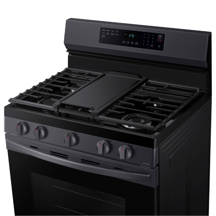 Samsung 6.0 cu. ft. Smart Freestanding Gas Range with No-Preheat Air Fry & Convection in Black Stainless Steel angled view of top griddle product image