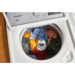 WTW4107SW Whirlpool® 4.2 - 4.3 Cu. Ft. Top Load Washer with 2-in-1 Removable Agitator in room with clothes product image