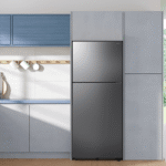 RT70F18LASR Samsung 18 cu. ft. Top Freezer Refrigerator with Ice Maker in Stainless Steel in room product image